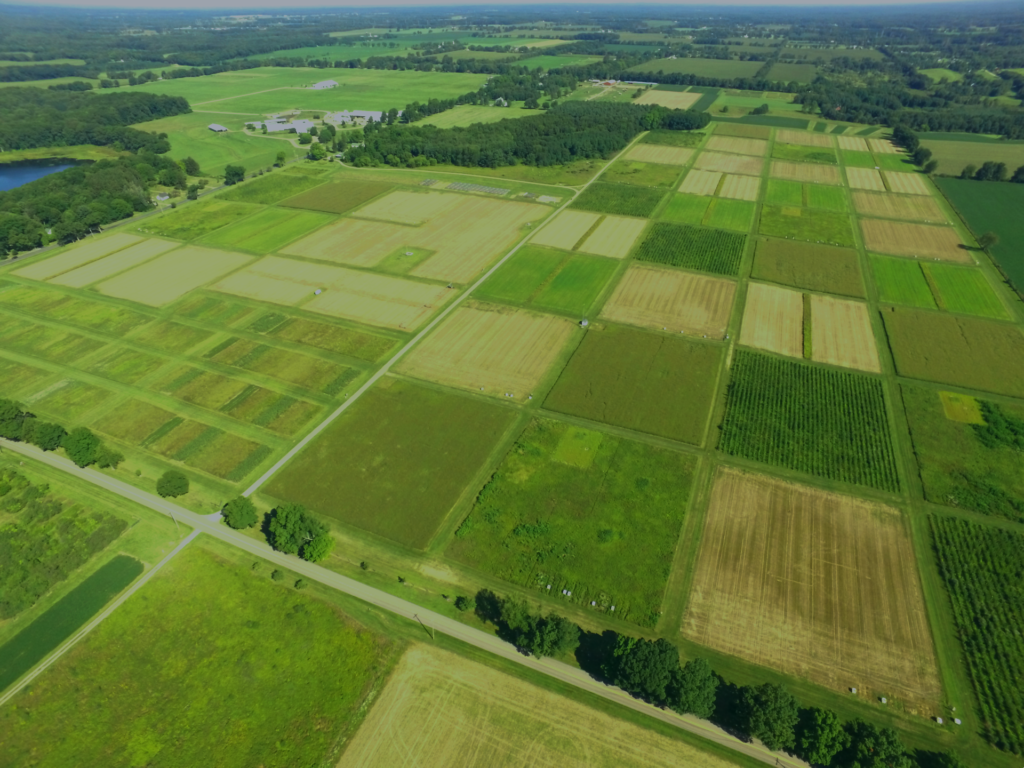 An aerial photo showing several farmland fields. 