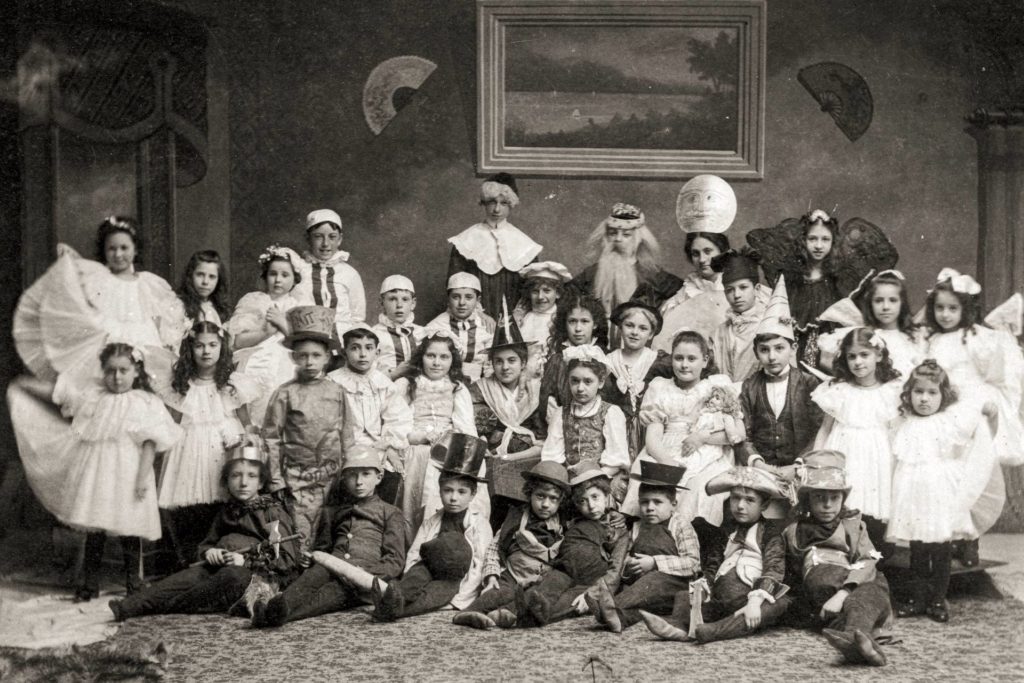 A group photo of several children at a pageant